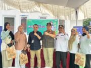 BNPB dan PNM Bangkitkan Ekonomi Penyintas di Huntara Kabupaten Agam Lewat Ikan Asap Danau Maninjau