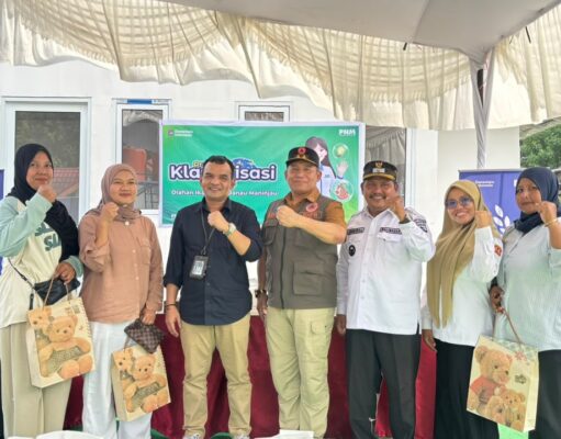 BNPB dan PNM Bangkitkan Ekonomi Penyintas di Huntara Kabupaten Agam Lewat Ikan Asap Danau Maninjau